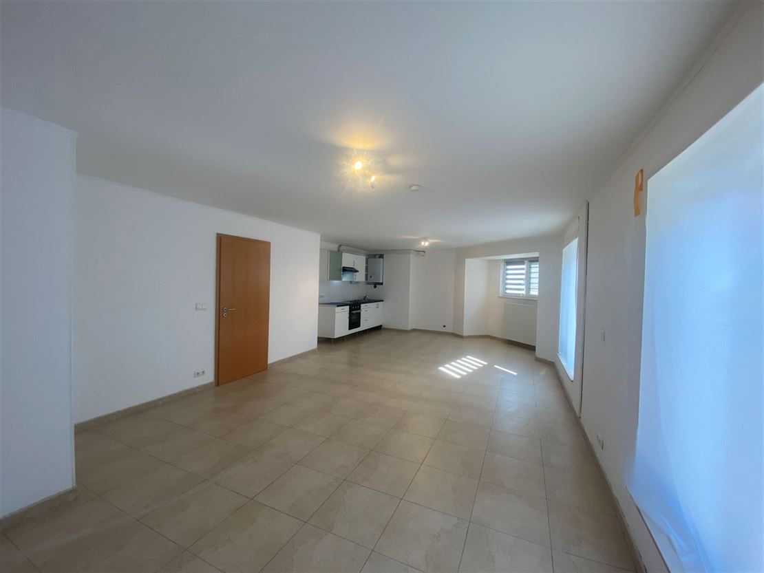 APPARTEMENT AU REZ-DE-CHAUSSEE  SITUE EN PLEIN COEUR DU CENTRE-VILLE 